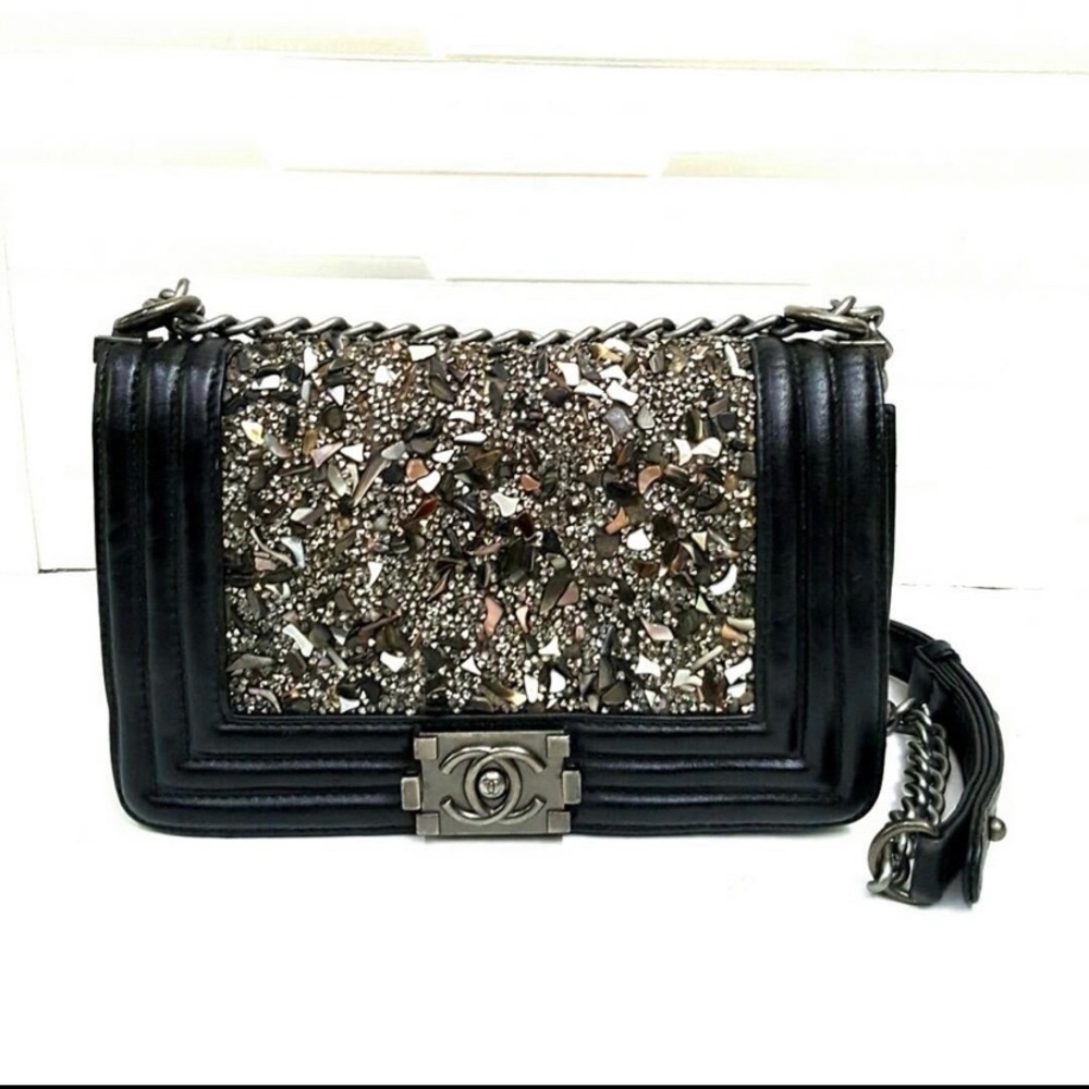 Chanel Le boy crystal bag has a small ripped no dust bags. AUTHENTIC!